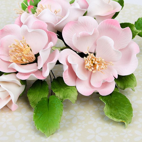 Dog Rose Combo Sprays in Pink are gumpaste sugarflower cake decorations perfect as cake toppers for cake decorating fondant cakes and wedding cakes. Caljava wholesale cake supply.