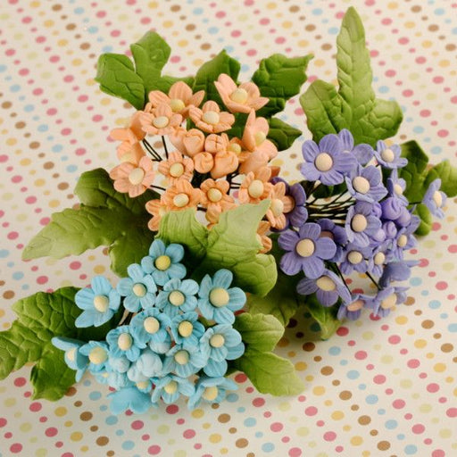 Gumpaste Forget Me Not Flower Fillers mixed colors for cake decorations for fondant wedding cakes & cupcakes.