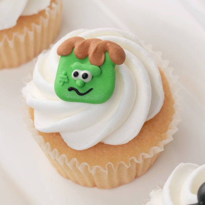Halloween Royal Icing Toppers for decorating your own cupcakes, chocolates, cookies, cakes, and other desserts. Edible hand piped icing toppers ready to use on your food by caljava. Perfect ready to use decorations.