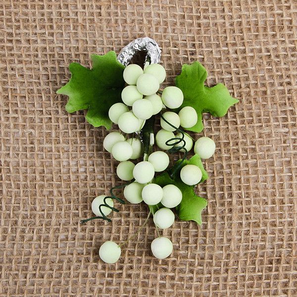 These beautiful Grape sprays in Green are readymade by hand from gumpaste.  Gumpaste flowers offer a way of decorating cakes hassle free for both professional and amateur decorators.  Each spray is bound by bendable wires that make for easy positioning and application on cakes.