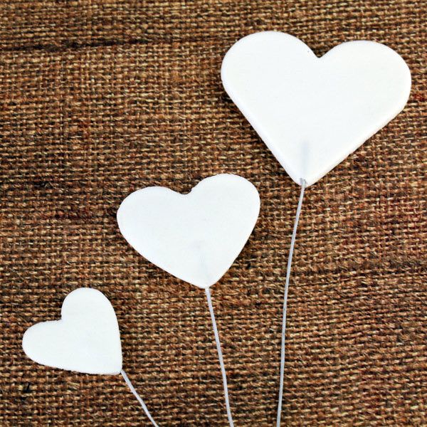 Fondant Heart Bursts Applique perfect for cake decorating birthday cakes & valentines cakes. Simply color the hearts and apply them on the cake.  Wholesale cake supply. Sugarflower.