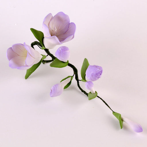 Edible Purple Freesia Filler Sprays sugar flower cake toppers and cake decorations perfect for cake decorating rolled fondant wedding cakes, cupcakes and birthday cakes and cupcakes.  Edible Cake Decoration and wholesale cake supplies.