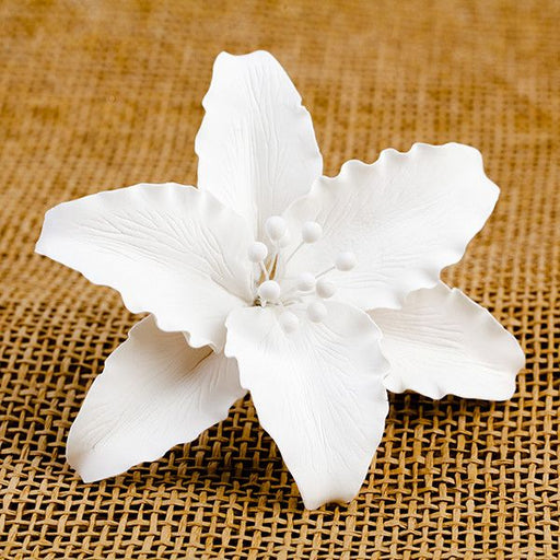 Casablanca Lilies are gumpaste sugarflower cake decorations perfect as cake toppers for cake decorating fondant cakes and wedding cakes. Caljava wholesale cake supply.