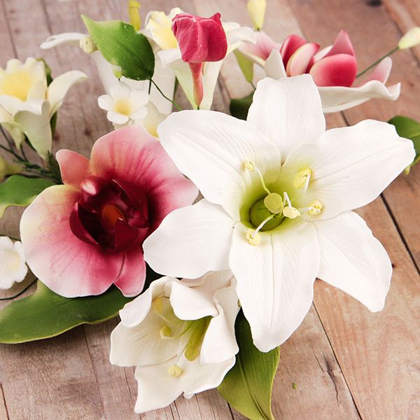 Day Lily & Phalaenopsis Large Orchid Sprays are gumpaste sugarflower cake decorations perfect as cake toppers for cake decorating fondant cakes and wedding cakes. Caljava wholesale cake supply.