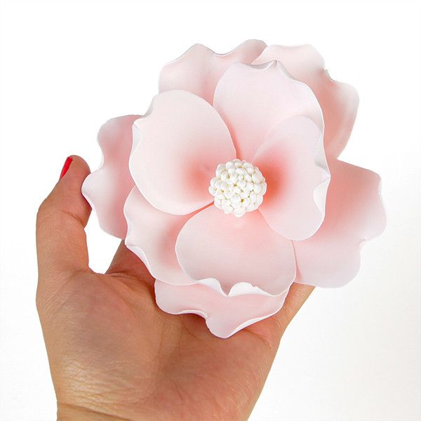 Pink Gumpaste Magnolia Cake Topper and Cake Decoration perfect for Cake Decorating rolled fondant wedding cakes and rolled fondant birthday cakes. Wholesale bakery supplies. Cake topper