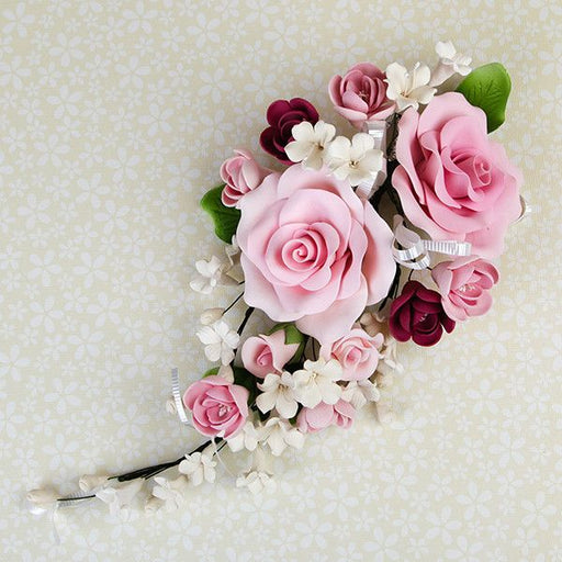 Large Open Rose Sprays are gumpaste sugarflower cake decorations perfect as cake toppers for cake decorating fondant cakes and wedding cakes. Caljava wholesale cake supply.