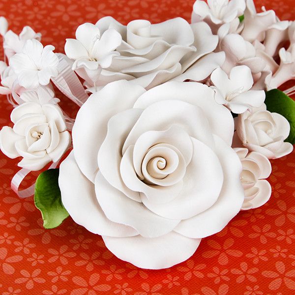 Large Open Rose Sprays in White are gumpaste sugarflower cake decorations perfect as cake toppers for cake decorating fondant cakes and wedding cakes. Caljava wholesale cake supply.
