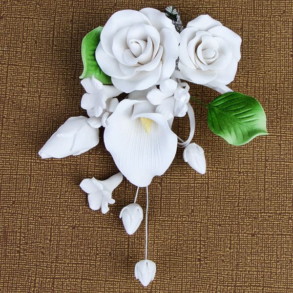 Medium Tea Rose & Calla Lily Sprays in White are gumpaste sugarflower cake decorations perfect as cake toppers for cake decorating fondant cakes and wedding cakes. Caljava wholesale cake supply.