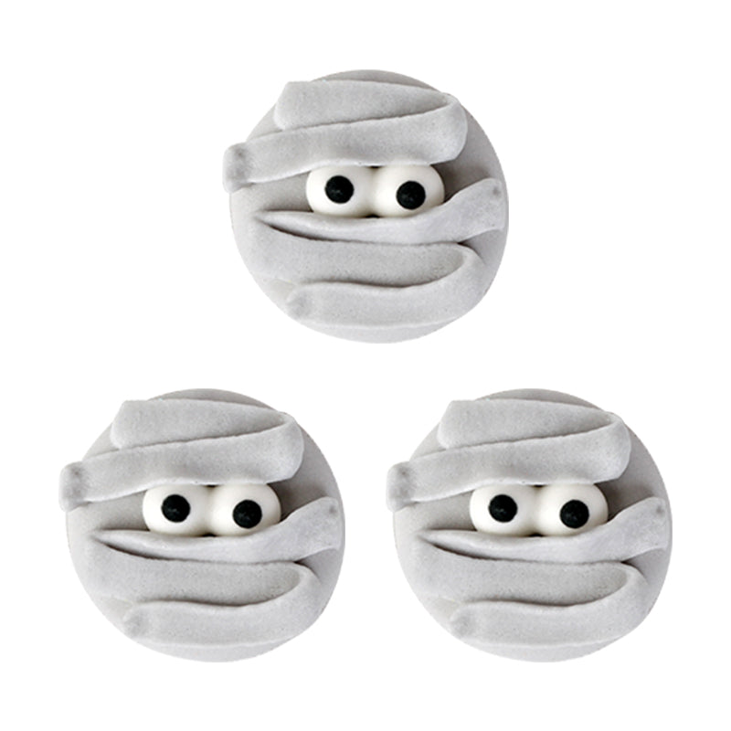 Mummy Halloween Edible Royal Icing Toppers great for decorating cupcakes, cookies, cakes, candy and chocolates.  Great for decorating Halloween cakes, cupcakes, cookies, candy and more. Can even be Zombie heads.
