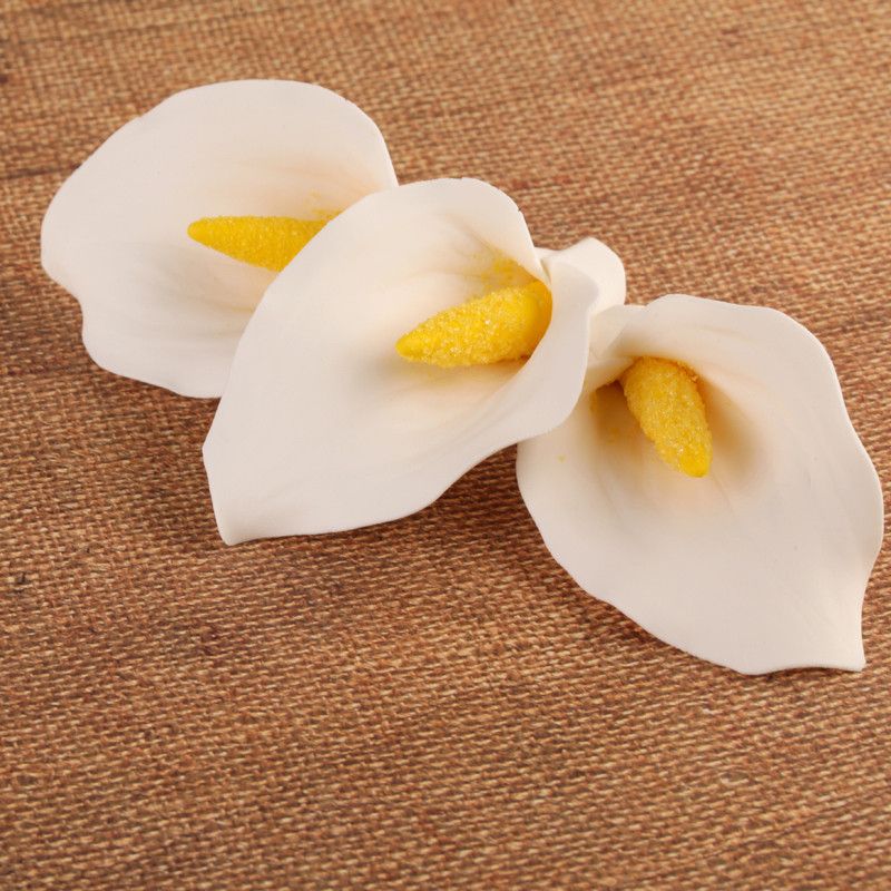 Medium gumpaste calla lily cake decoration perfect as a cake topper for cake decorating rolled fondant wedding cakes and rolled fondant birthday cakes, also works as a great cupcake decoration.