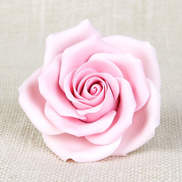Readymade by hand from gumpaste, this pre-wired Pink Chantilly Rose can be easily placed on cakes and offer a way of decorating hassle free for both professional and amateur decorators.