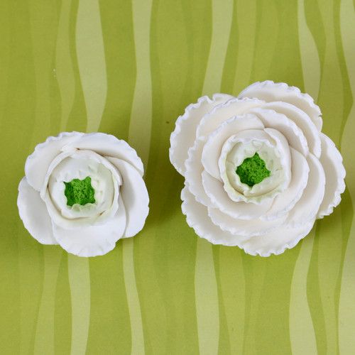 White Gumpaste Ranunculus sugarflower handmade cake decoration perfect as a cake topper for cake decorating fondant cakes.  Wholesale sugarflowers and bakery supply.