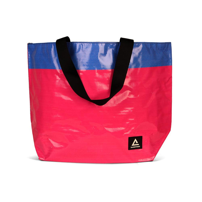 The Essential Tote for carrying your personal and cake items around with you. Made with recycled billboard material.