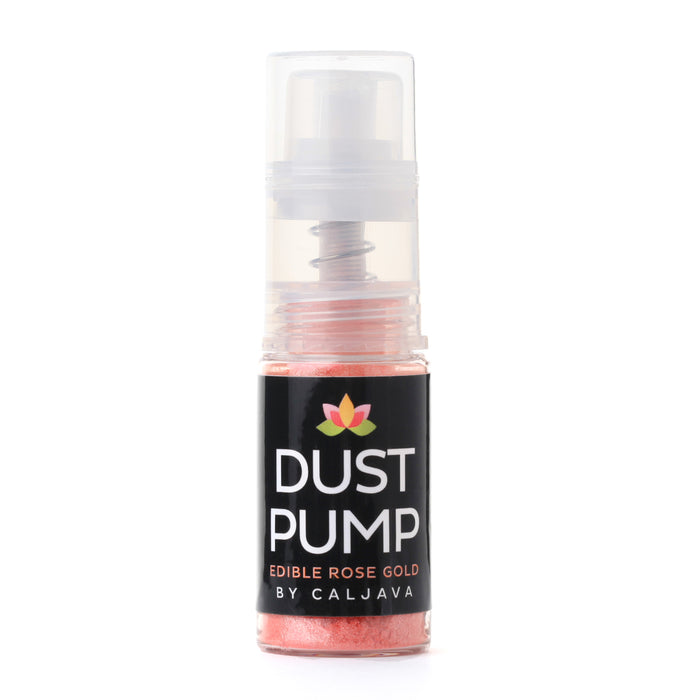 Rose gold edible luster dust pump spray creating a soft pearlescent finish on desserts and confections