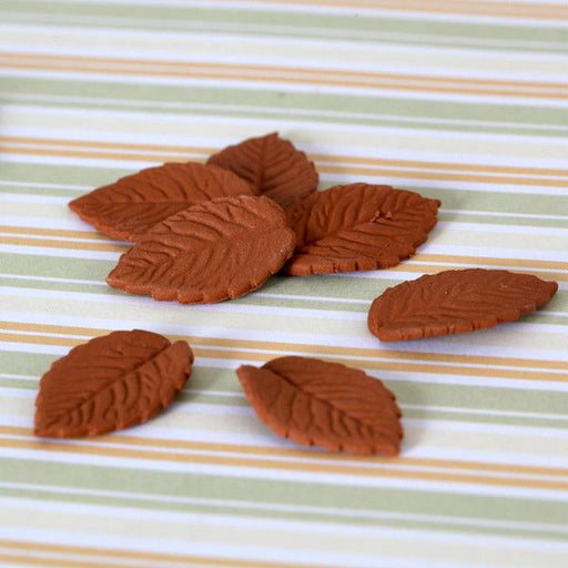Dark Chocolate Rose Leaves Sugarflower cake decoration made from gumpaste perfect as cake toppers for cake decorating fondant cakes and cupcakes.