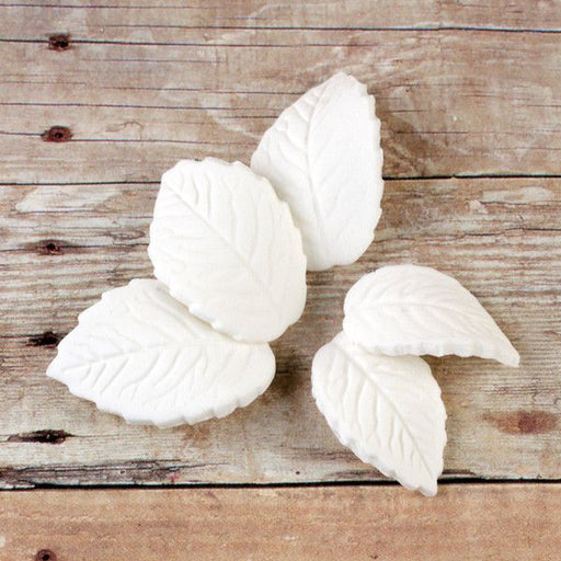 White Rose Leaves Sugarflower cake decoration made from gumpaste perfect as cake toppers for cake decorating fondant cakes and cupcakes.