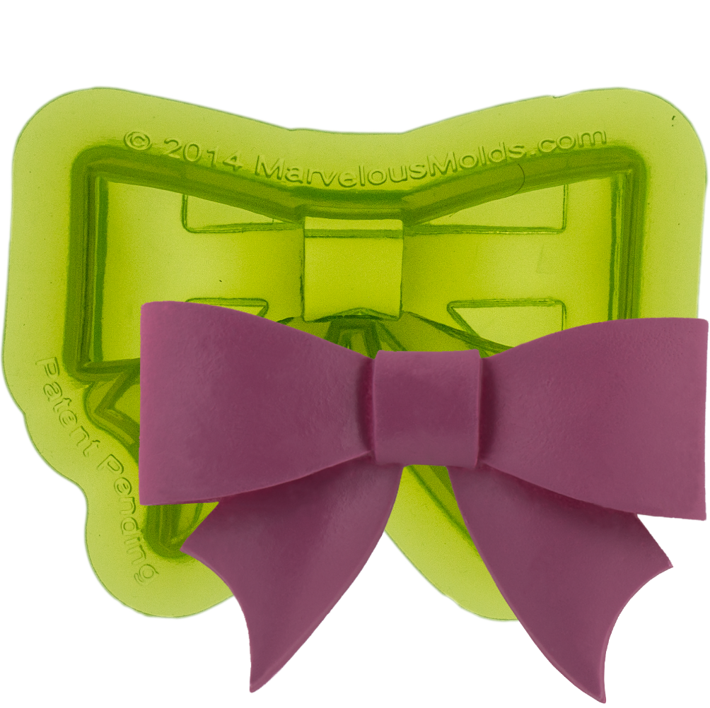 Classic Bow Fondant Mold designed to easily create perfect bows for decorating your cakes and other foods.