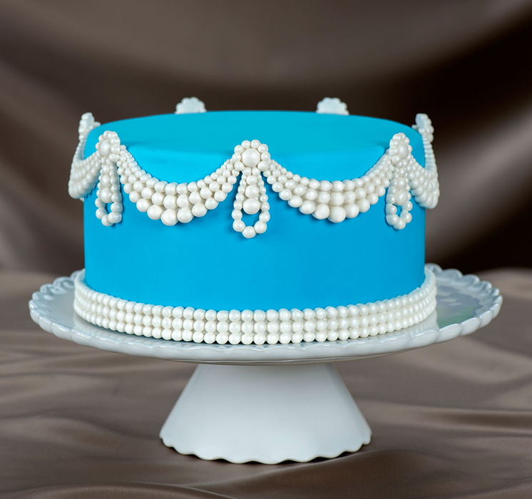 Fondant Pearl Border Mold great for creating your own fondant cake border with elegant pearl texture. Cake decorating tool perfect for making wedding cakes and birthday cakes. Marvelous Molds.
