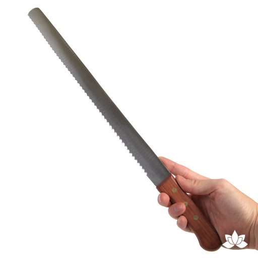 Serrated Cake Knife 14" stainless steel used for cutting layers in your larger cakes when cake decorating.  A cake decorator's must have in the bakery or kitchen.