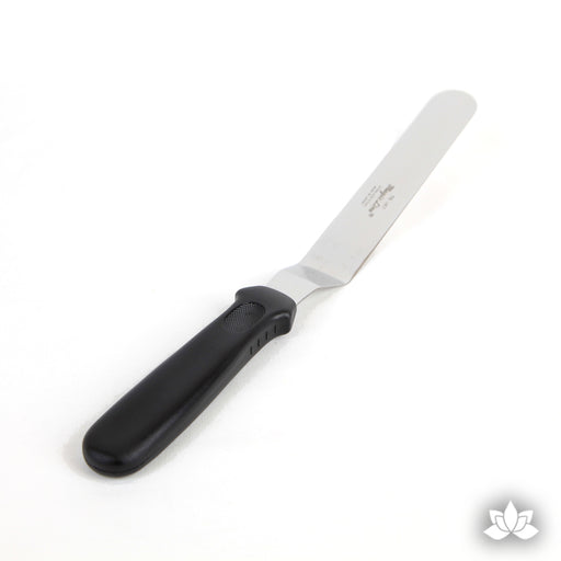 Offset Icing Spatula Stainless steel spatula used for cake decorating and spreading the icing on your cake.  A cake decorator's must have in the bakery or kitchen.