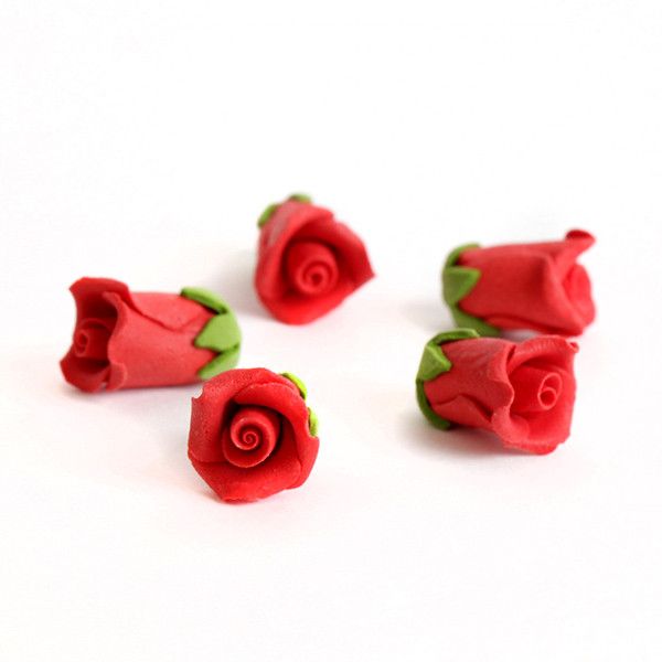 Tiny Red Rose Sugarflowers made of gumpaaste perfect for cake decorating fondant cakes and cupcakes.  Edible cake decorations.  Wholesale sugarflowers.