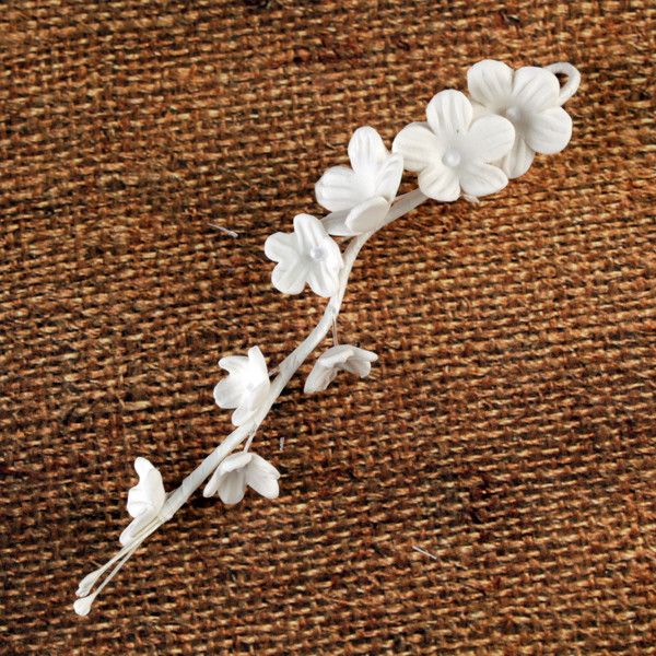 White 8 Petal Blossom Filler Sprays cake decorations and cake topper perfect for cake decorating rolled fondant wedding cakes, buttercream birthday cakes, and cupcakes.  Wholesale Cake Supply. Caljava