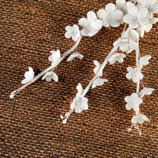 White 8 Petal Blossom Filler Sprays cake decorations and cake topper perfect for cake decorating rolled fondant wedding cakes, buttercream birthday cakes, and cupcakes.  Wholesale Cake Supply. Caljava