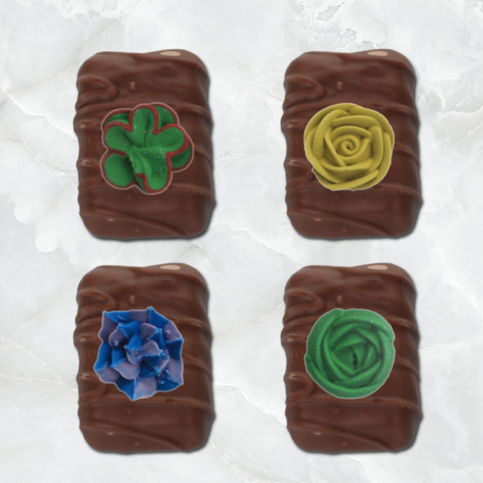 Succulent Royal Icing Toppers great for decorating cakes, cupcakes, chocolates, candy, cookies, and more.  Edible topper for cake decorating.