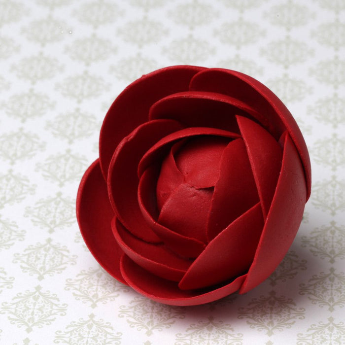 Modern red rose sugar flowers used to decorate a tiered wedding cake by Caljava