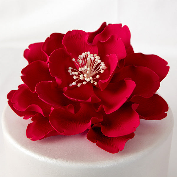 Elegant 7" red open peony sugar flowers used to decorate a tiered wedding cake