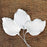 Detailed view of realistic green gum paste rose leaf cluster with textured leaf veining for custom cake toppers.Wholesale cake supply.