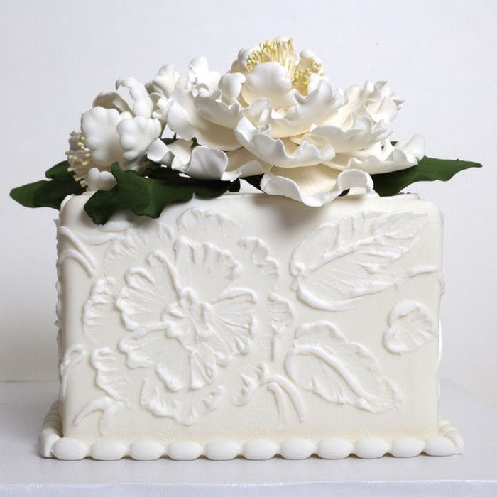 Large white gumpaste peony spray arrangement handmade cake decoration. Caljava