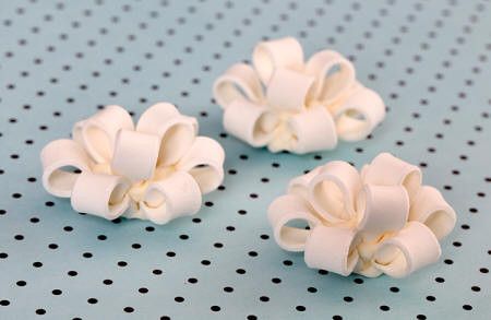 Fondant Cupcake Bows in White. Wholesale available.
