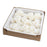 Premade large white Cora peony sugar flower placed on a modern rustic buttercream cake by Caljava
