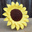 Single handcrafted 4.5-inch medium sunflower gumpaste sugar flower cake decoration with realistic yellow petals and textured dark center.