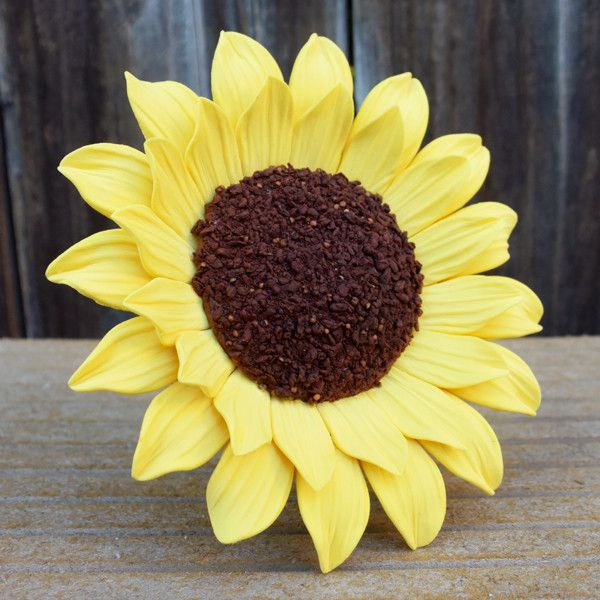 Single handcrafted 4.5-inch medium sunflower gumpaste sugar flower cake decoration with realistic yellow petals and textured dark center.