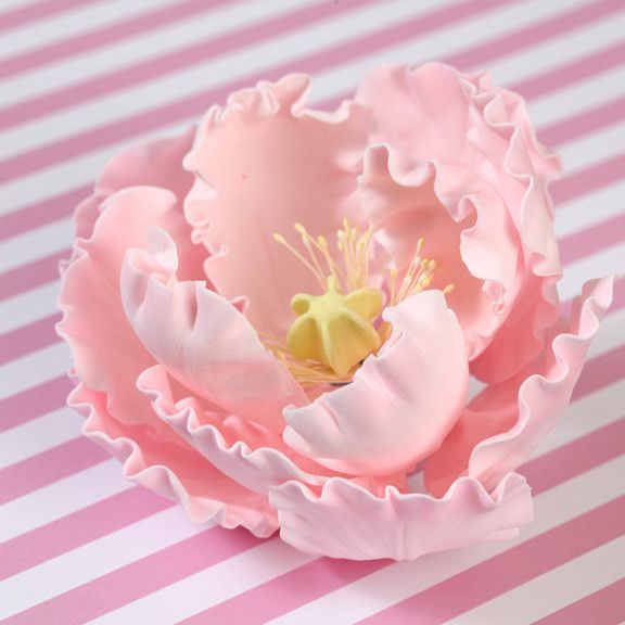 Handcrafted pink peony gumpaste flower used on a professional wedding cake by Caljava