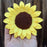 pre-wired extra large sunflower gumpaste flower showing bendable wired stem for easy positioning on tiered cakes.