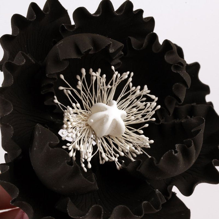 Ready-made black peony sugar flower cake topper for elegant wedding cakes