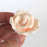 Realistic handcrafted ivory sugar flowers that bring professional-grade botanical detail to custom celebration cakes.